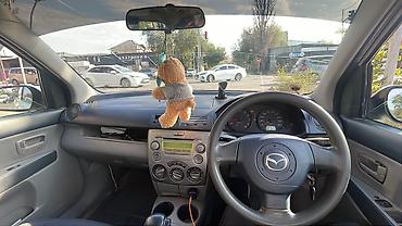 Продажа авто: Mazda Demio: 2003 г., 1.3 л, Автомат, Газ, Хэтчбэк — 7