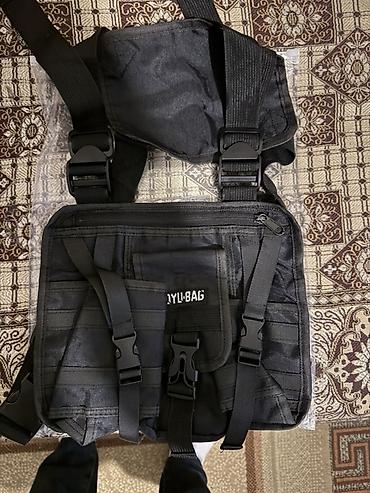 İdman çantaları: Məhsul: JYU-BAG taktiki sinə çantası (chest rig) Təsvir: - Rəng: Qara — 3