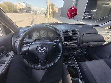 Mazda: Mazda Familia: 2002 г., 1.6 л, Механика, Бензин, Универсал — 9