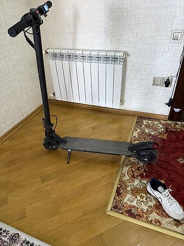 Elektrik nəqliyyatı: Elektrik skuter - Şəhər içi rahat hərəkət üçün kompakт elektrik — 4