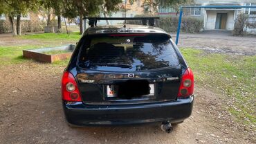 Mazda: Mazda 323: 2002 г., 1.6 л, Механика, Бензин, Хэтчбэк