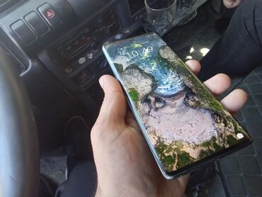 prasdoy telefonlar: Honor X9a, 16 GB, rəng - Boz, Sensor, Barmaq izi, Simsiz şarj