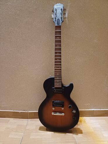 elektro gitara satilir: Elektron gitara, Gibson, 6 sim, İşlənmiş, Ünvandan götürmə