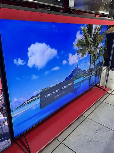 LED-телевизор большой диагонали (около 65–75"). Тонкие рамки