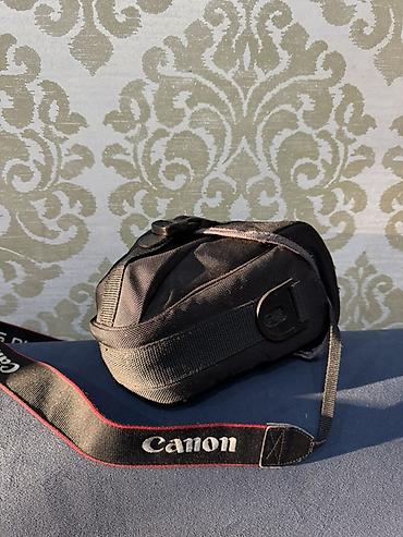 digital camera: Зеркальная фотокамера Canon EOS 550D с универсальным зум-объективом — 4