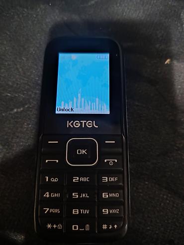 KGTEL B110 düyməli mobil telefon Xüsusiyyətlər: - Kompakt korpus