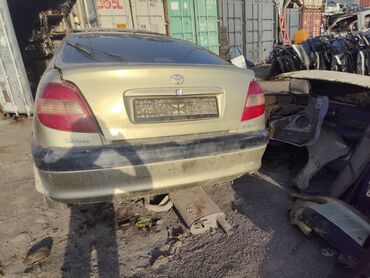 фары на опель вектра б: Автомобиль Toyota Avensis золотистого цвета, представленный как кузов
