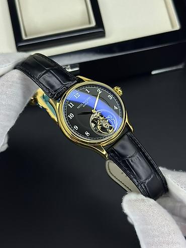 mexanik saatlar: Patek Philippe mexaniki qol saatı – klassik dizayn, turbyon üslublu — 1