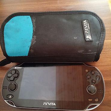 dubay ayfon 15: Sony PlayStation Vita (PS Vita) oyun konsulu işlədir Zaryadqa yerin — 2