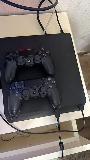 PlayStation 4 Slim oyun konsolu Xüsusiyyətlər: - Model: PS4 Slim