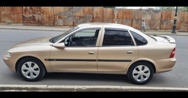 opel vectra oluxanasi: Opel Vectra: 1.8 l | 1997 il | 1000 km Sedan