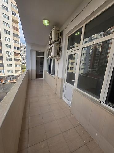 kv ev: Nəsimi metrosu yaxınlığında bolmartın üstündə yeni tikili binada 92 kv — 4