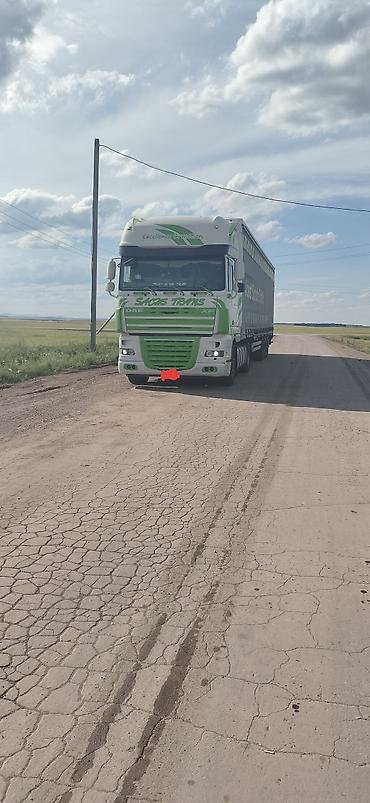 Транспорт: Тягач, DAF, 2012 г., Тентованный — 1
