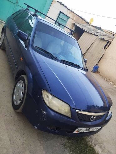 мазда трибуте: Mazda Familia: 2001 г., 1.6 л, Механика, Бензин, Хэтчбэк