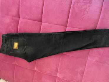ledzend pantalone: Crne farmerke marke Dolce & Gabbana. Izrađene su od 100% pamuka i