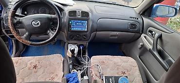 mazda 323 (bh): Mazda 323: 2002 г., 1.8 л, Механика, Бензин, Хэтчбэк — 8