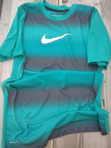 crne iscepane farmerke muske: Dres, S (EU 48), Nike, bоја - Tirkizna