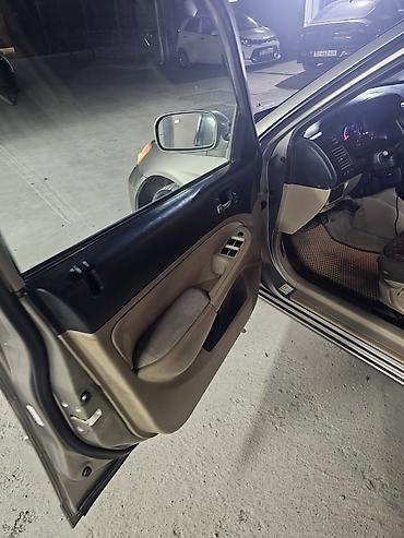 mazda 3 2005: Honda Civic: 2004 г., 1.5 л, Автомат, Гибрид, Седан — 8