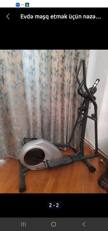 Əlcəklər: Evdə məşq üçün nəzərdə tutulmuş, qara metal çərçivəli və gümüşü rəngli