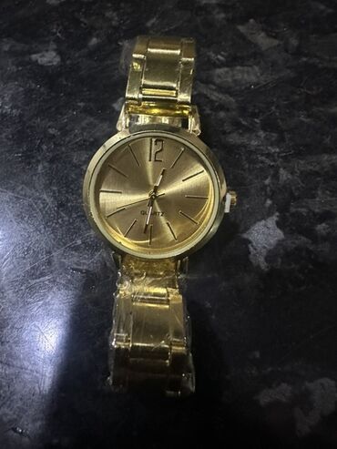 tek qaş uzuklər: Qol saatı, Quartz, rəng - Qızılı