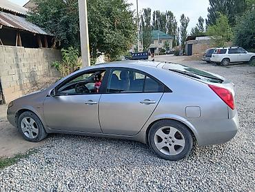 смешанный: Nissan Primera: 2002 г., Бензин, Лифтбек — 4