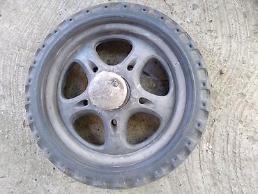 mima buggy: Zadnji tocak za decija kolica spoljni precnik 23 cm.,otvor za osovinu — 3