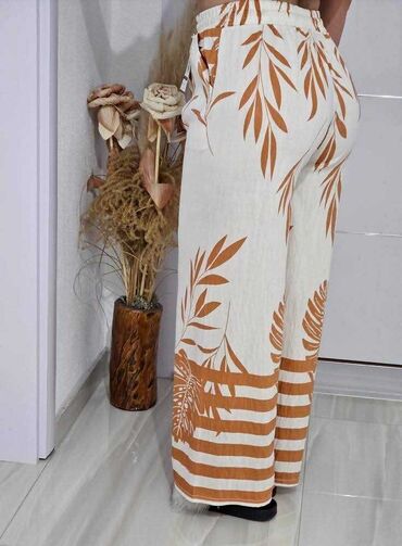 Pantalone: 06. Pantalone 
M/L i Xl/2xl — 14