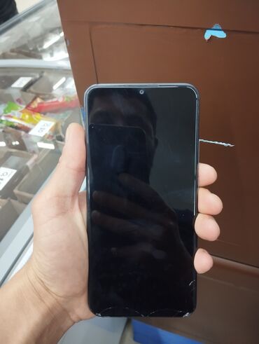 naxcivan telefon qiymetleri: Xiaomi Redmi 9, 32 GB, rəng - Qara, 
 Barmaq izi, İki sim kartlı, Face ID