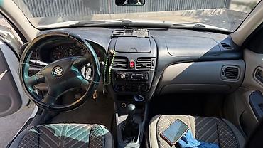 li one: Nissan Almera: 2001 г., 1.5 л, Механика, Бензин, Хэтчбэк — 4