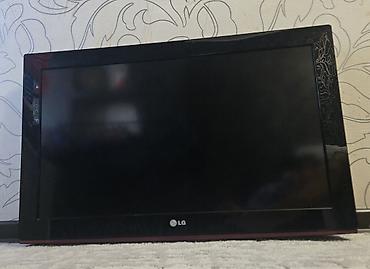 Телевизор LG, диагональ около 32". Плоская панель, глянцевая чёрная