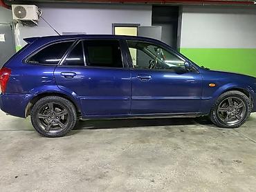 familia: Mazda Familia: 2000 г., Механика, Бензин, Хэтчбэк — 2