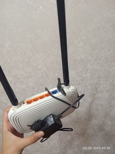 Принтеры: TP-Link şirkətinə məxsus simsiz router. Bu cihaz yüksək sürətli