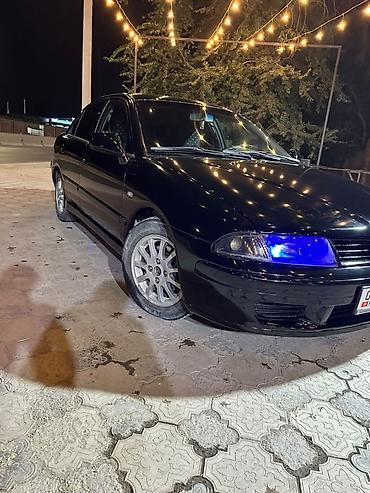 диска на авто: Mitsubishi Carisma: 2003 г., 1.8 л, Автомат, Бензин, Лифтбек — 2