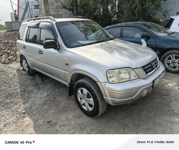 хонда домани: Honda CR-V, автомобиль серебристого цвета. Оснащен рейлингами на