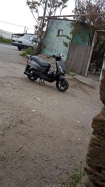 əlcek: Qara rəngdə şəhər üçün ideal skuter/scooter. Xüsusiyyətlər: - Geniş — 2