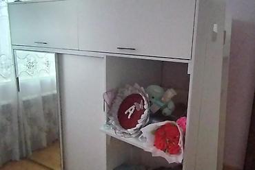 islenmis masa: Aşagi şkafdi ve stol masasi. Yuxari kravatdi. Az iştenib — 1