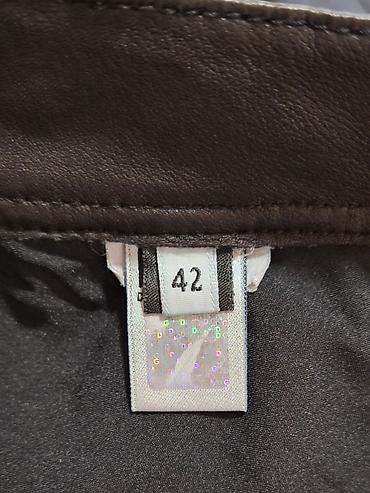 Pantalone: Ženske crne uske pantalone Dolce Gabbana sa kožnim efektom. - — 13