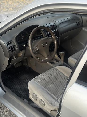 машины спорт: Mazda Capella: 2000 г., 2 л, Автомат, Бензин, Седан — 9