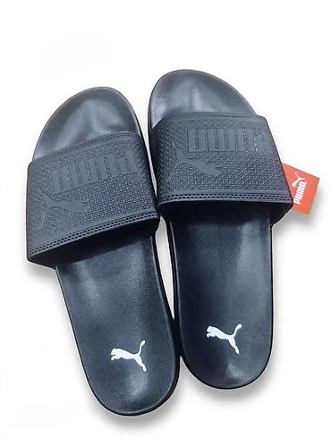 planika kucne papuce: PUMA unisex papuče – klasične “slide” sandale - Brend: PUMA - Model — 2