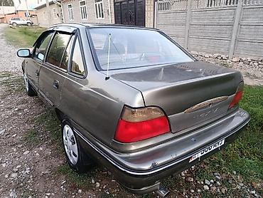 Унаа: Daewoo Nexia: 2004 г., 1.5 л, Кол менен иштөөчү, Бензин, Седан — 3