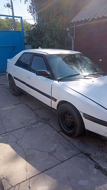 Транспорт: Mazda 323: 1990 г., 1.6 л, Механика, Бензин, Хэтчбэк — 4