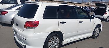 opel corsa b: Mitsubishi Airtrek (ağ rəng, universial kuzov. Maşının Matoru — 3