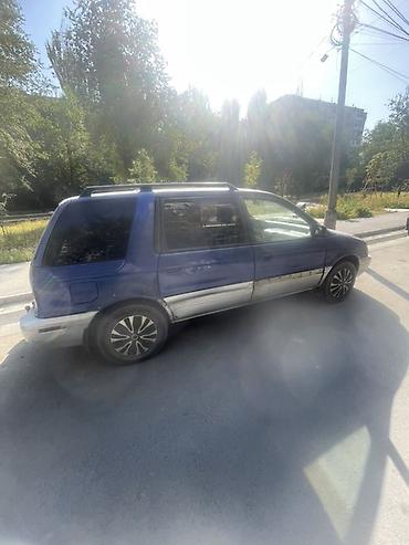посадка авто: Mitsubishi Space Wagon: 1996 г., 2 л, Механика, Бензин, Минивэн — 3