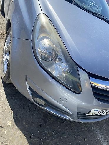 фургоны категории б: Opel Corsa D, sag fara satilir usten cixma 100% arginal lupali yalniz — 1