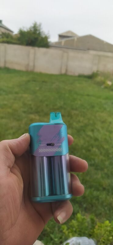 qarin ve bel piylerini eritmek: ELFBAR BC20000 modeli olan bu vape cihazı mavi rəngdədir və "BLUE RAZZ