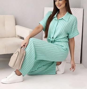Kompleti: ✅Ženski komplet – košulja i pantalone sa prugama
✅2700 din — 8