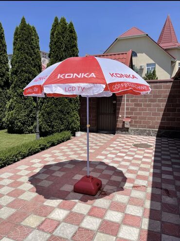 зонт для торговли: Продаётся фирменный зонт для отдыха и торговли. Имеется ножка, есть