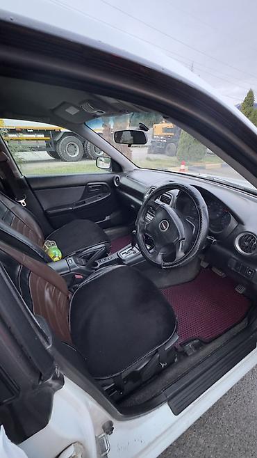 imprezza: Subaru Impreza: 2004 г., 1.5 л, Автомат, Бензин, Универсал — 7