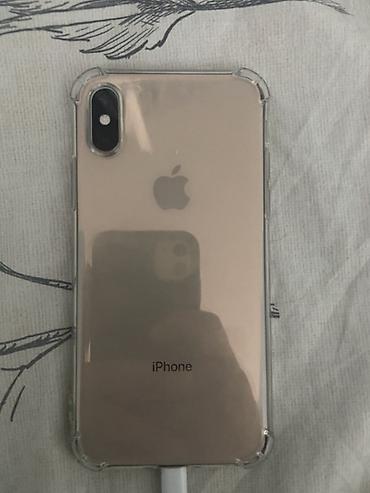 золотая часы: IPhone XS, 64 ГБ, золотой - Модель: iPhone Xs (номер модели MTAY2J/A) — 1