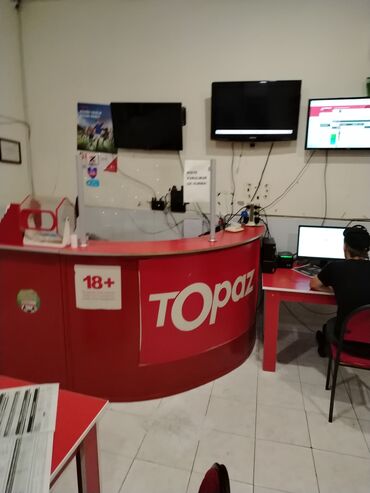 Hazır biznes: Topaz mərc oyunları zalı. Burada müştərilər idman oyunlarına mərc edə
